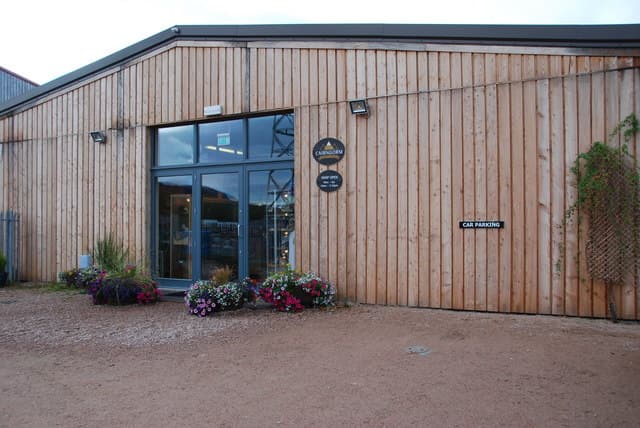 The timber-clad shop entrance of Cairngorm Brewery at Aviemore