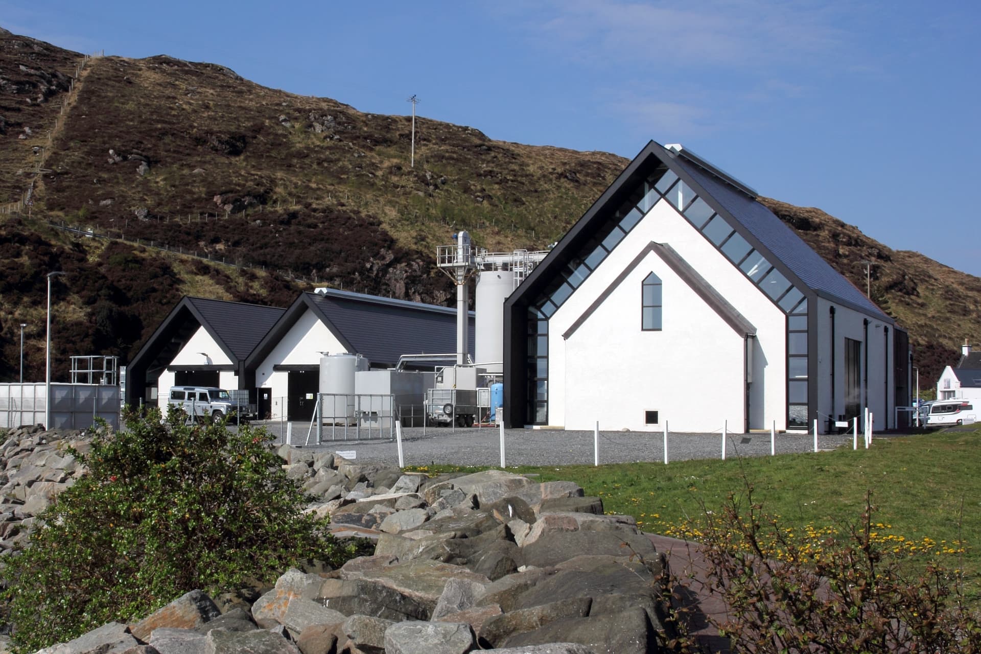 The white gabled Isle of Harris Distillery at Tarbert, Harris