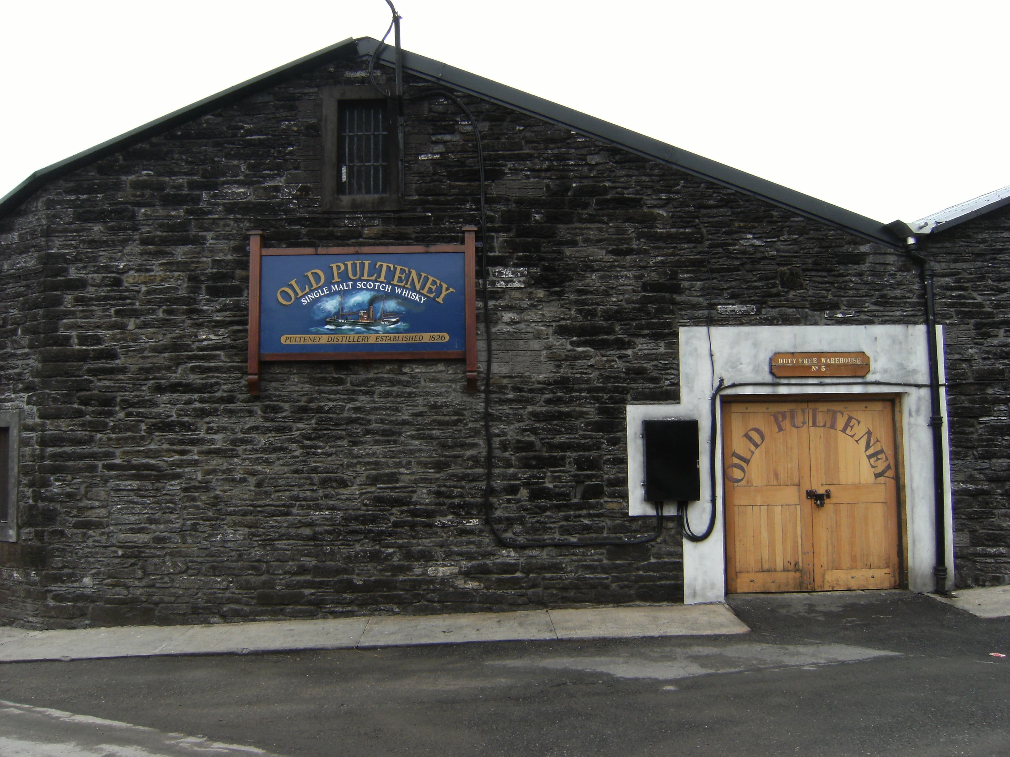 The Old Pulteney distillery entrance and nameboard in Wick