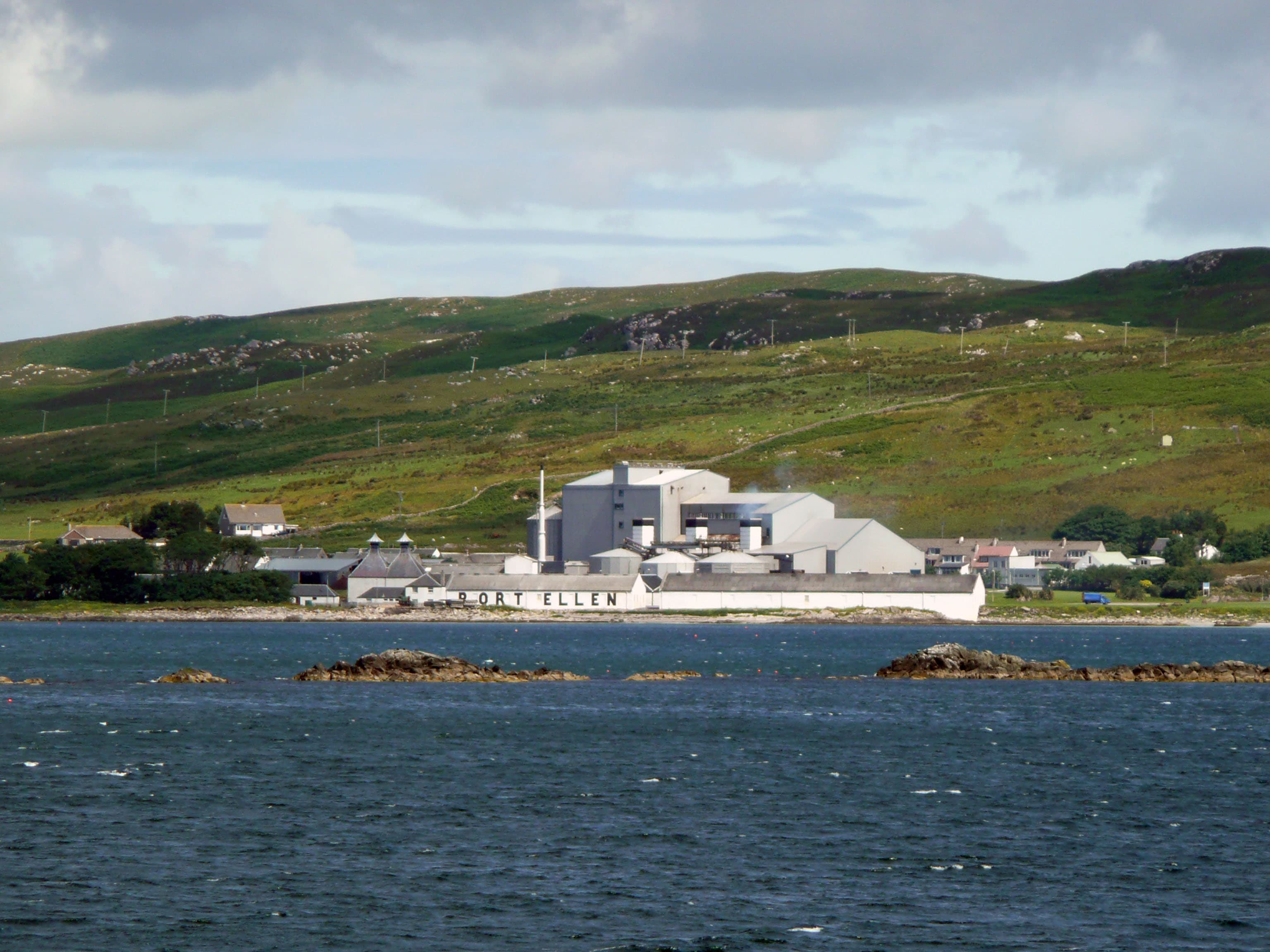 Port Ellen distillery seen across the bay on Islay