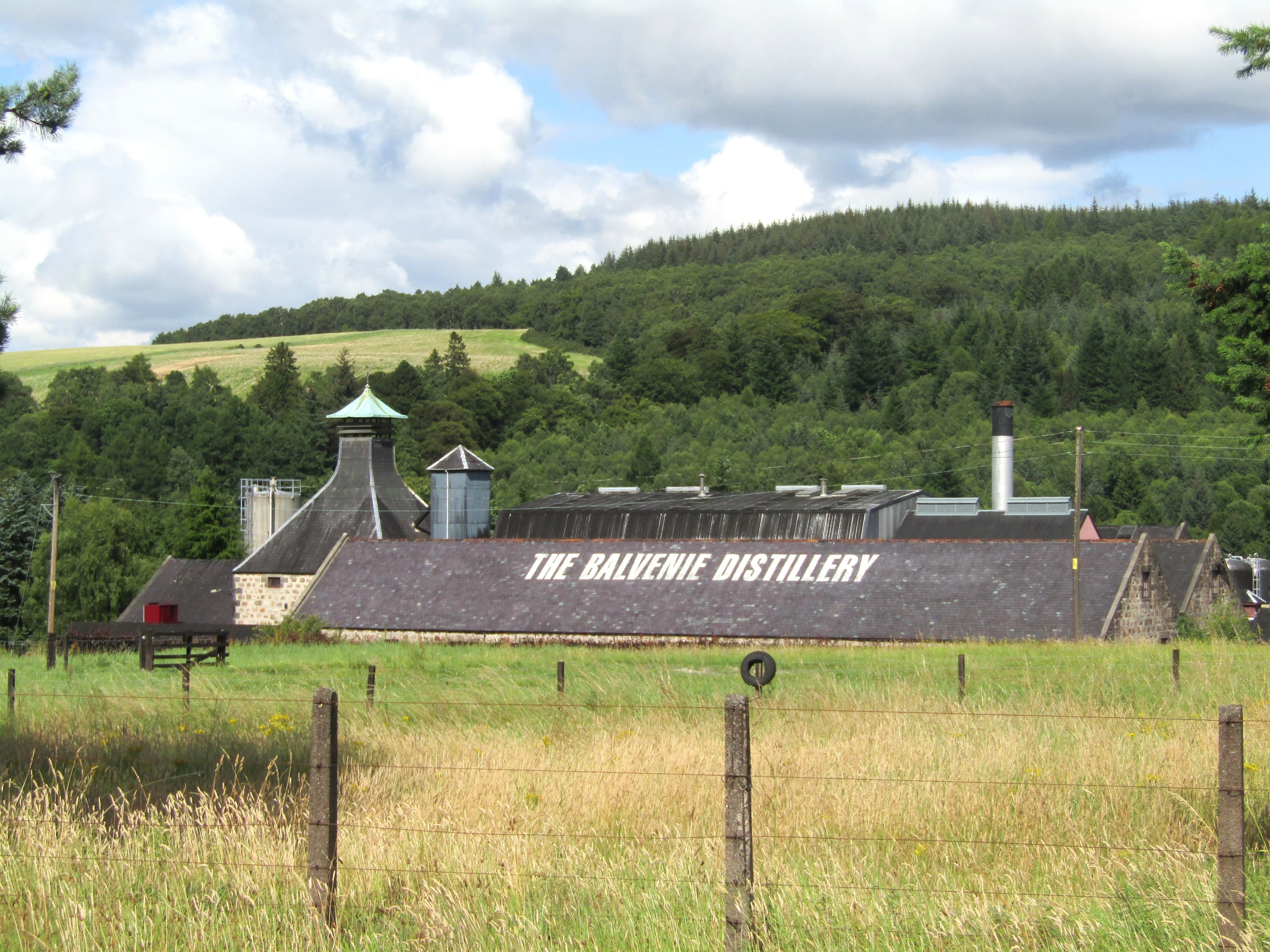 The Balvenie distillery at Dufftown with its name painted on the warehouse roof