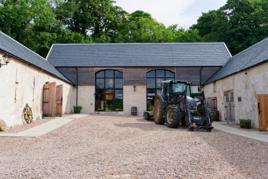 The converted farm steading housing Nc'nean distillery at Drimnin