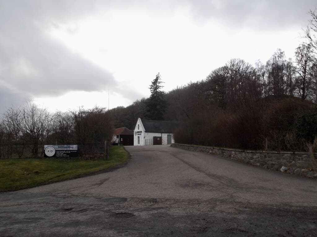 The white-washed Kinrara Distillery shop at the end of its drive near Aviemore