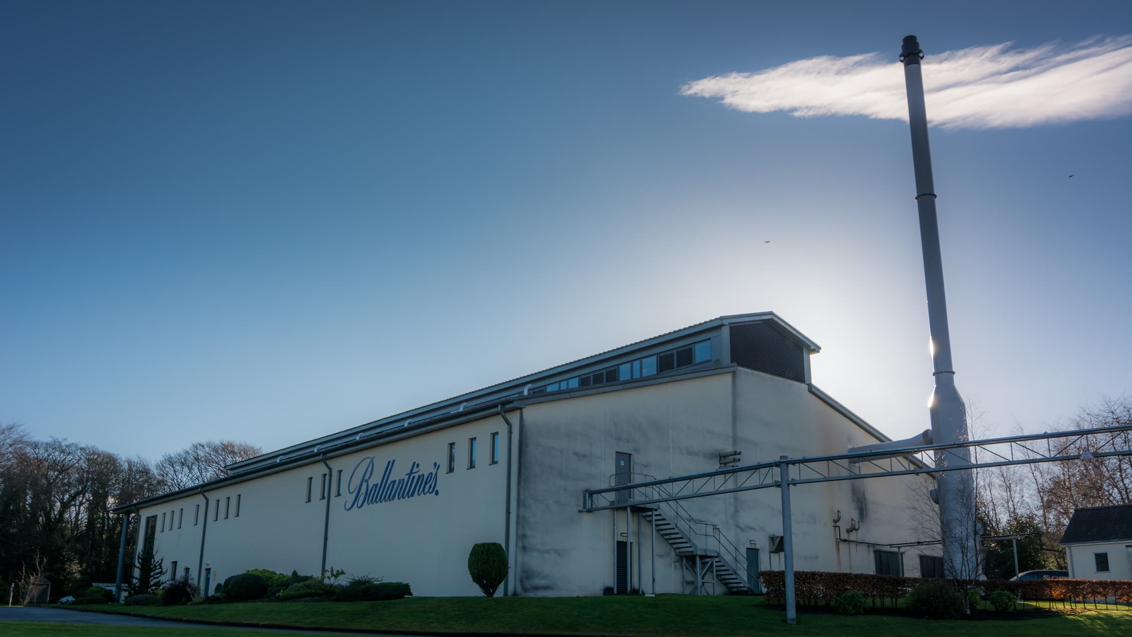 The Glenburgie distillery building carrying the Ballantine's name