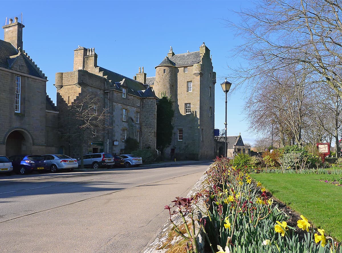 Dornoch Castle Hotel on Castle Street, Dornoch — the distillery is in the converted fire station beside it
