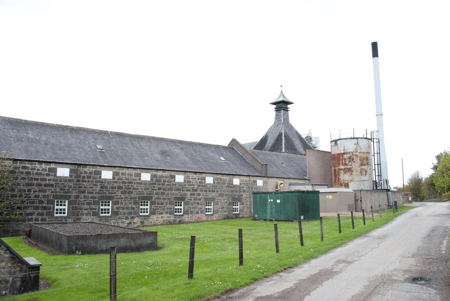 The long stone maltings and pagoda roof at Longmorn distillery