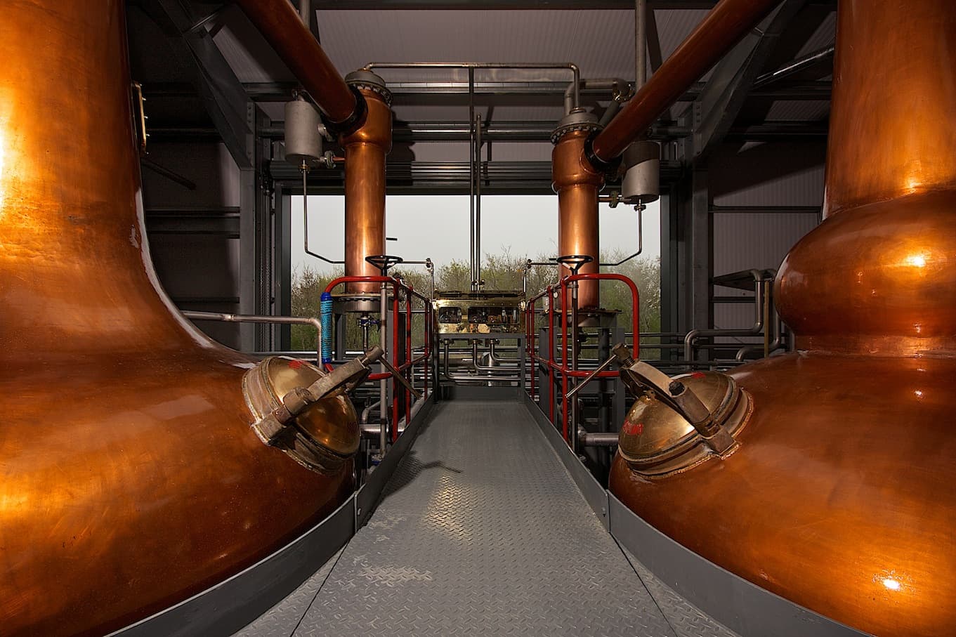 The wash still and spirit still in the still house at Wolfburn distillery