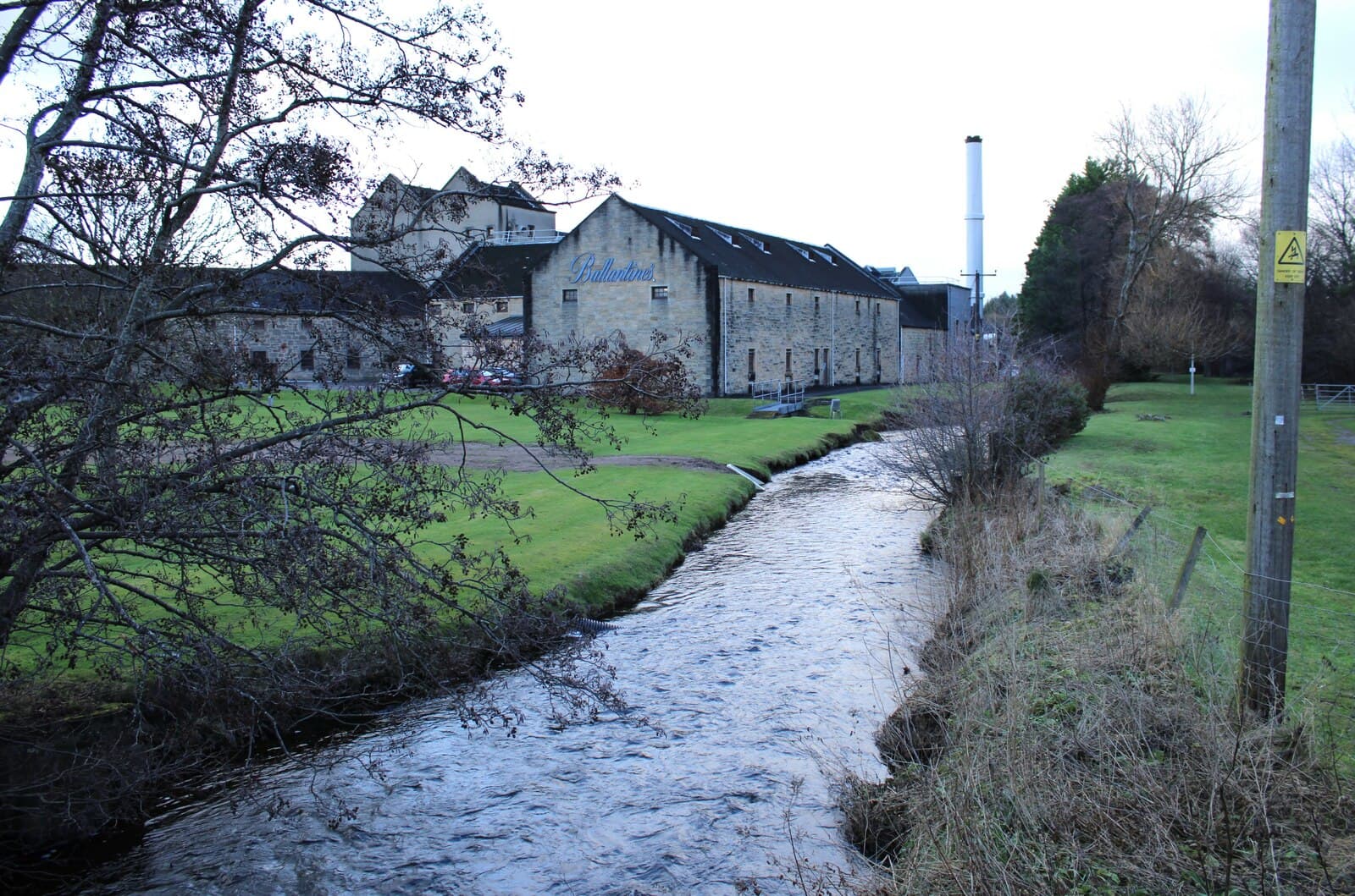 Miltonduff distillery beyond the burn that runs past it near Elgin