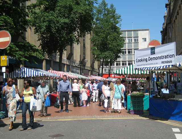 Shoppers among the striped stalls of Perth Farmers’ Market on King Edward Street
