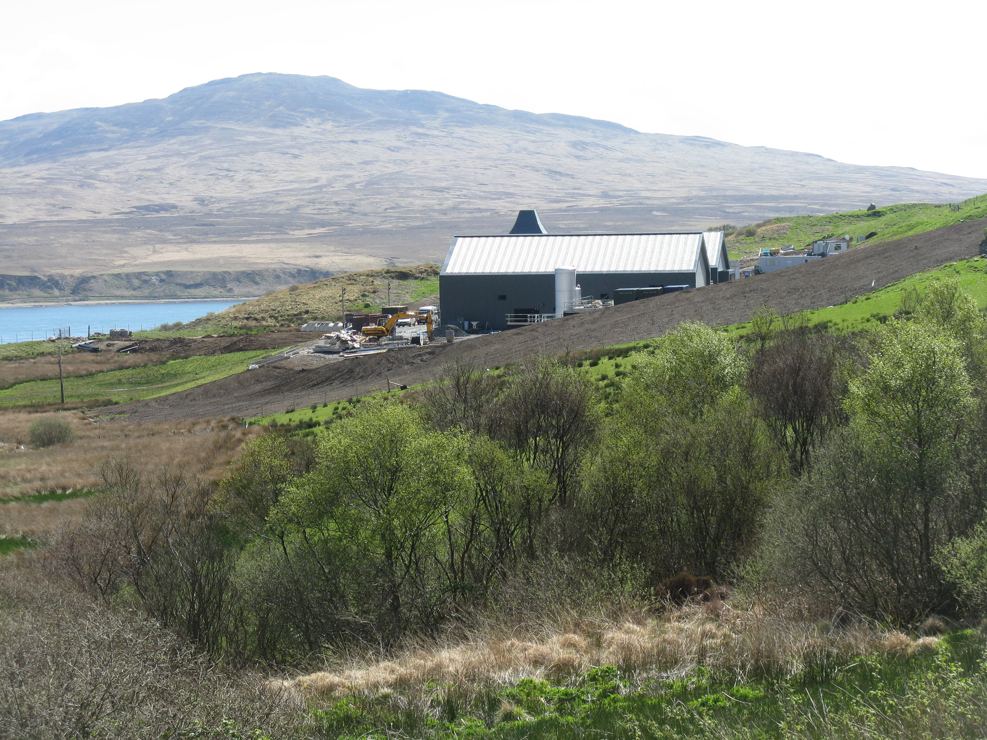 Ardnahoe distillery above the Sound of Islay with the Paps of Jura beyond