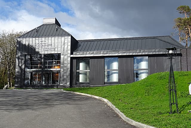 The modern distillery building at Isle of Raasay Distillery