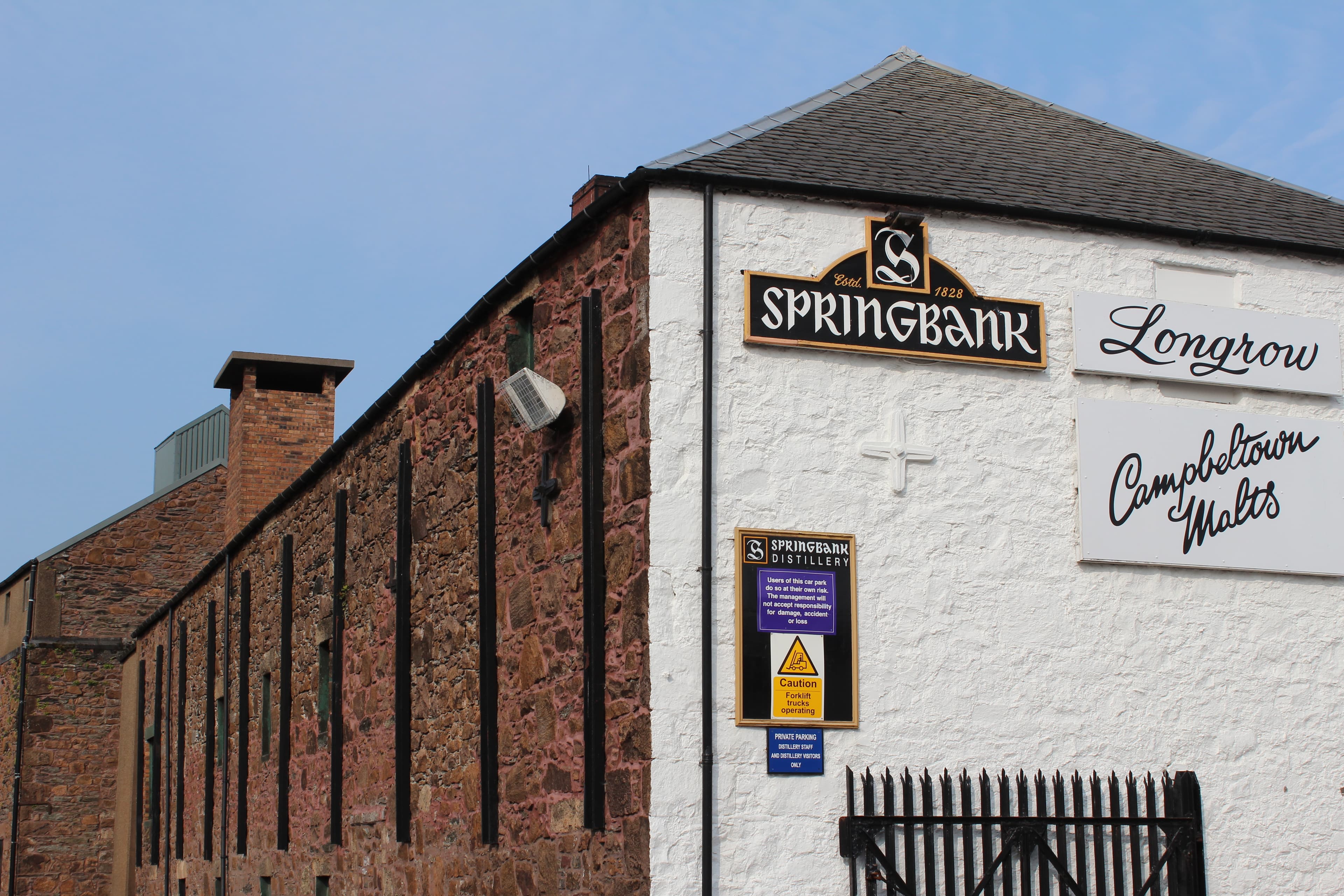 Springbank distillery's painted sign wall in Campbeltown
